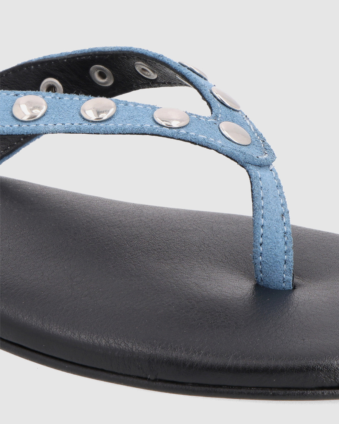 BLUE PIERCED SLIPPER