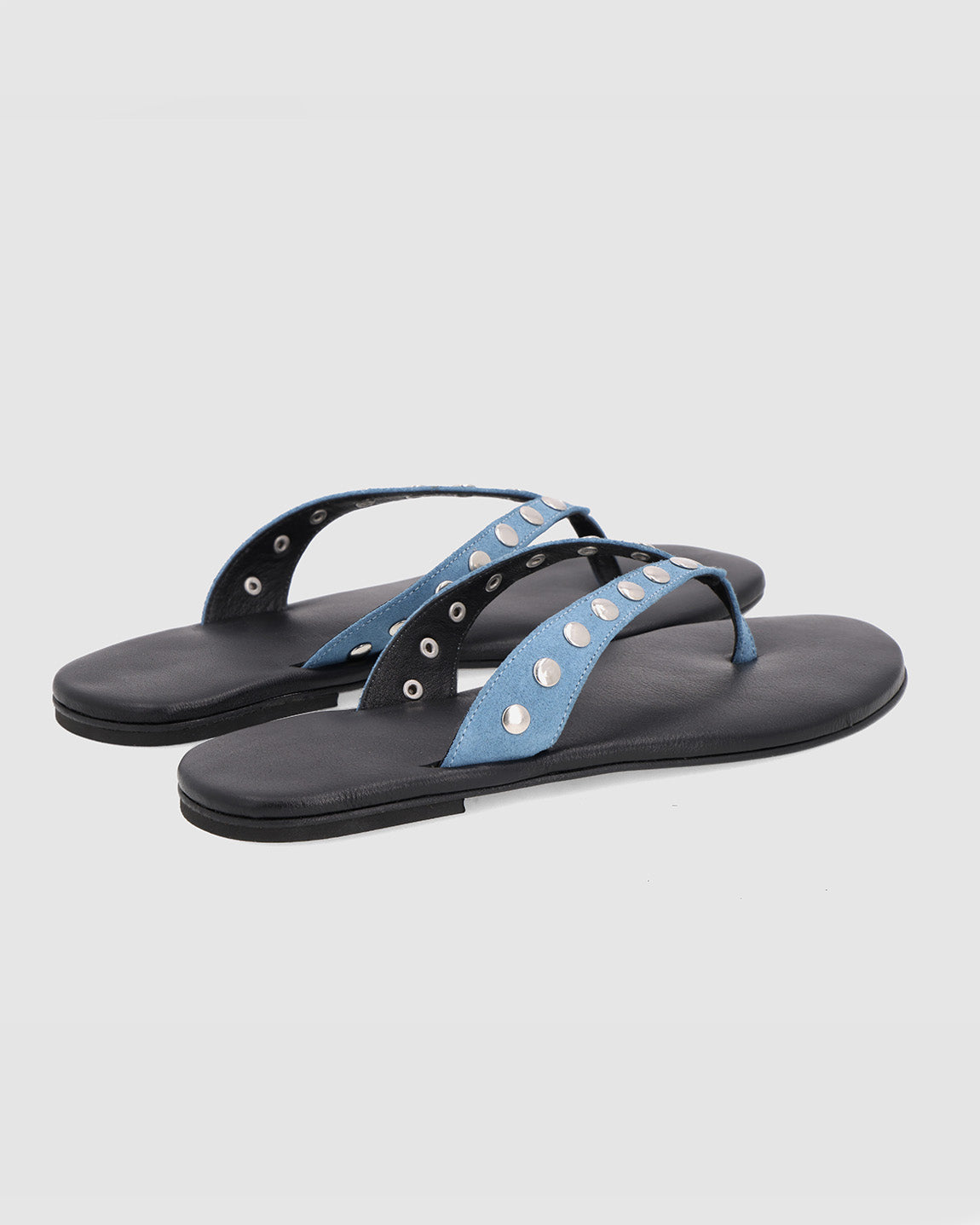 BLUE PIERCED SLIPPER